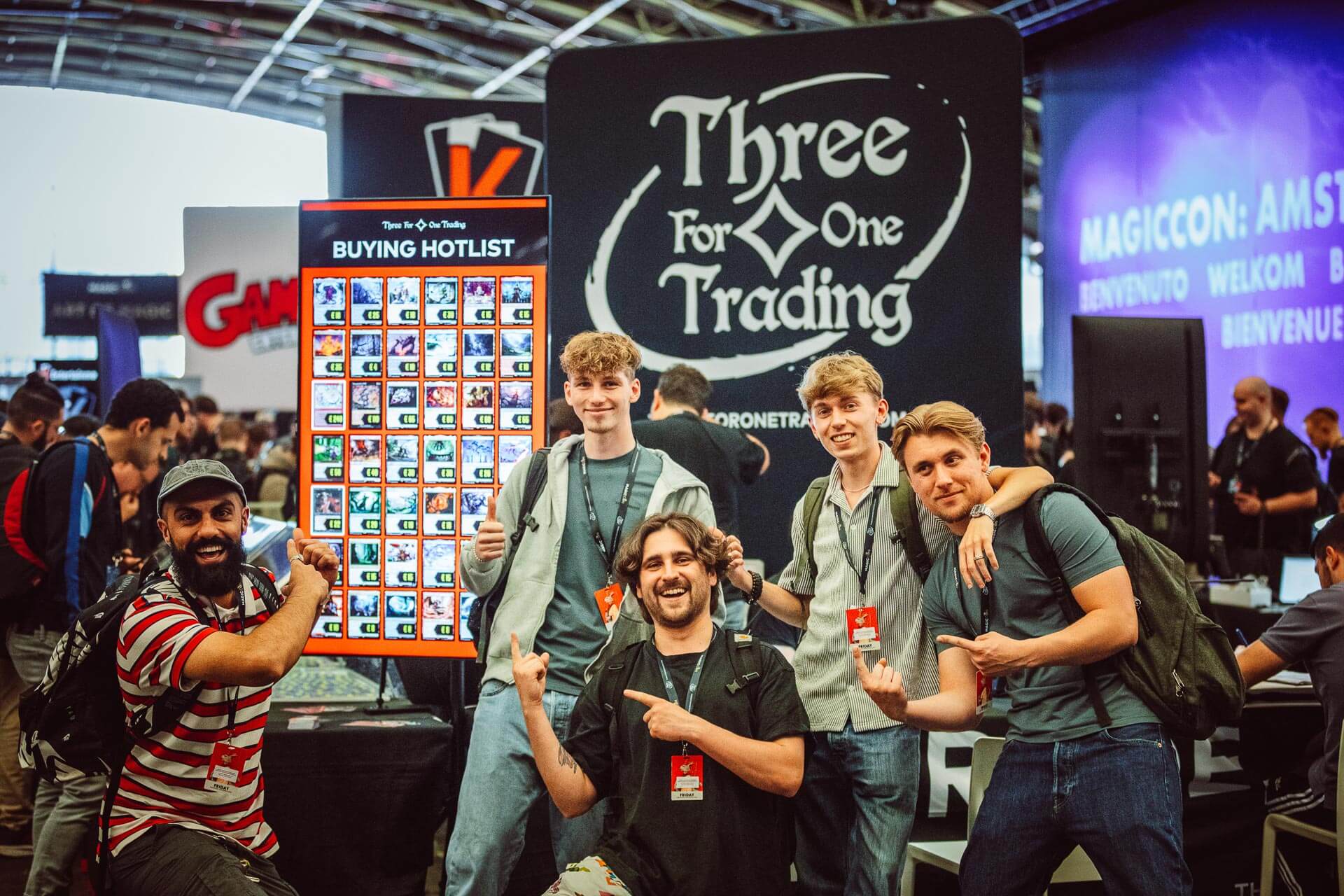 Group picture at the famous Three for One Trading booth